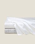 Ori Treccia flat sheet in white and sterling stack