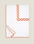 Treccia duvet cover white/orange folded
