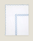 Treccia flat sheet folded in white/medium blue