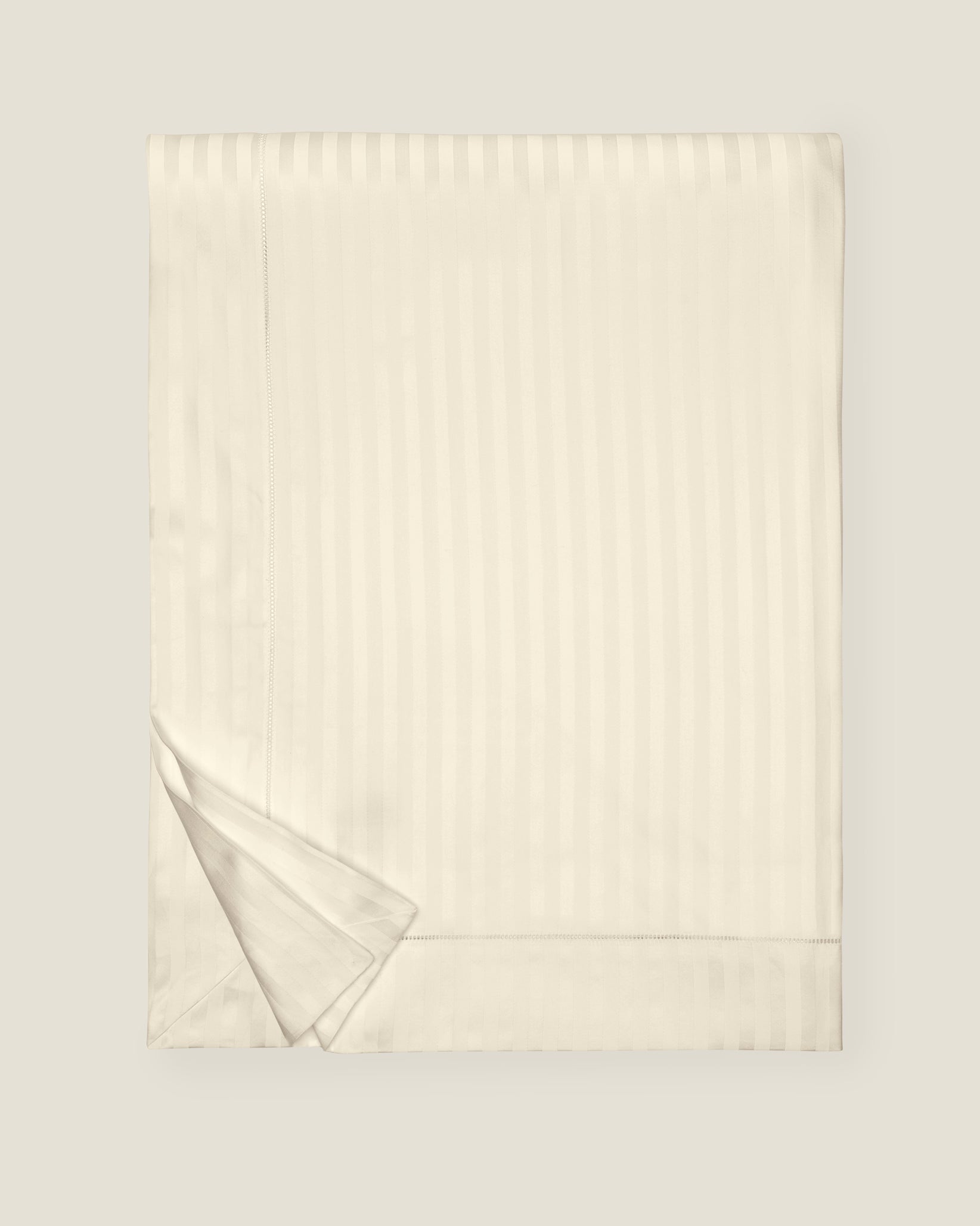 Raso Rigato duvet cover folded in beige