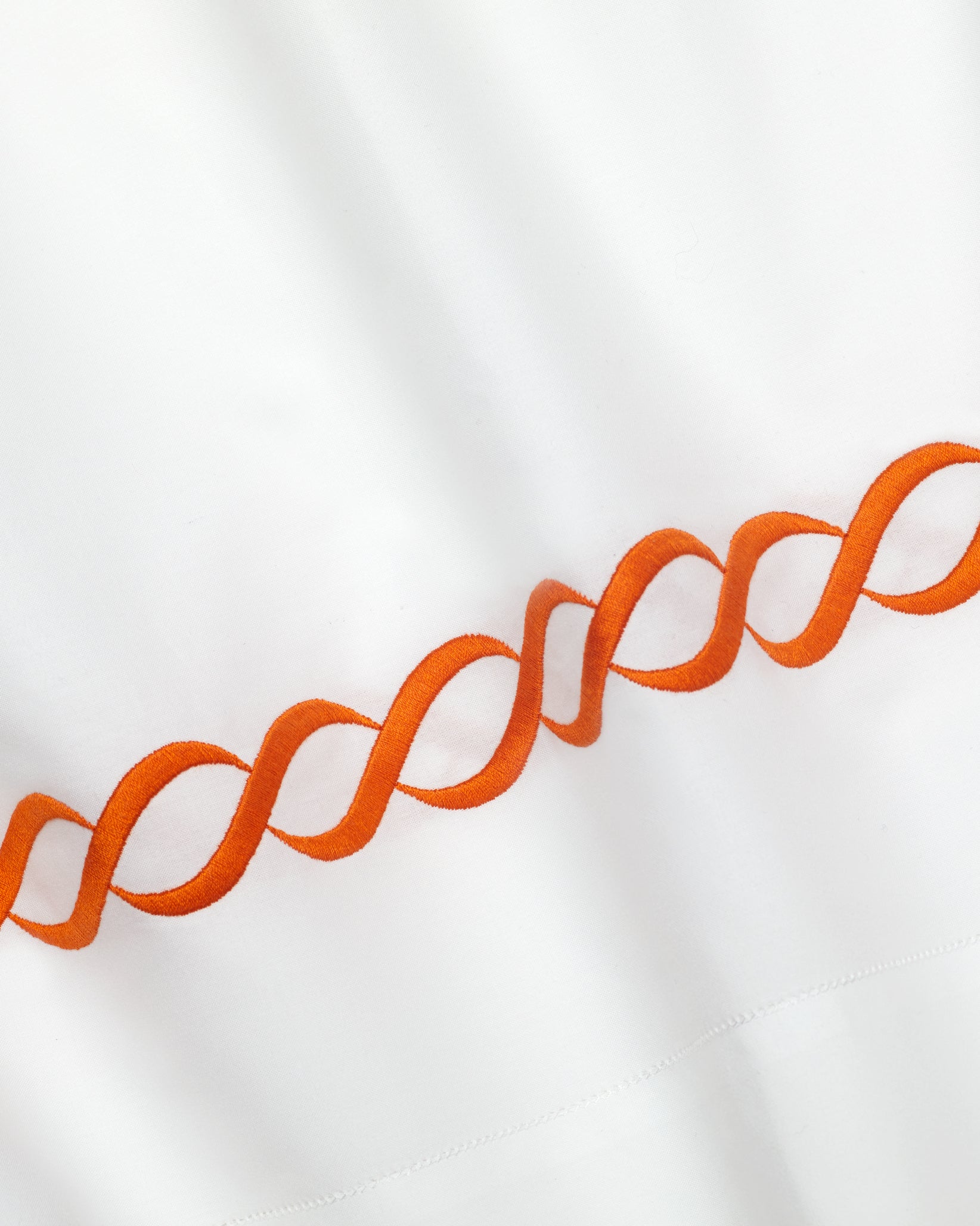 Treccia white/orange pillowcase texture