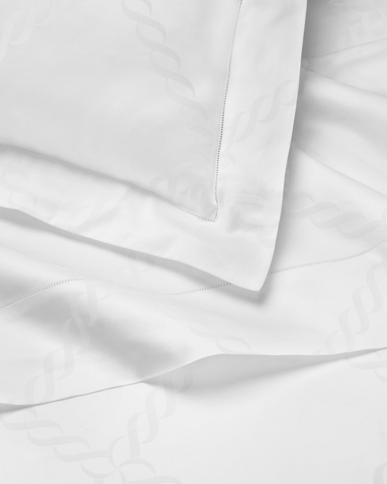 Ori Treccia white sham and flat sheet