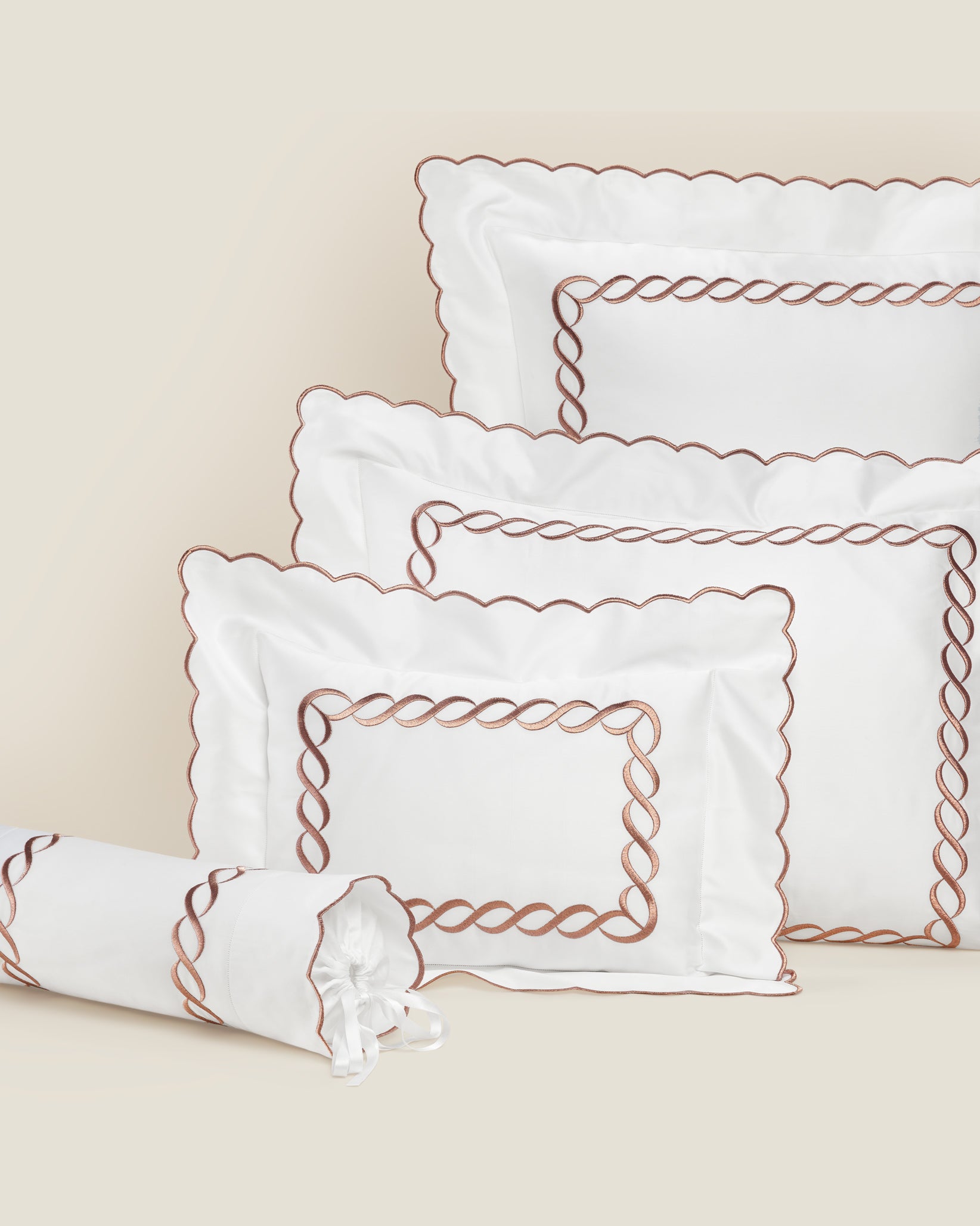 Treccia Splendore queen, standard, boudoir, and neckroll white/rose gold sham