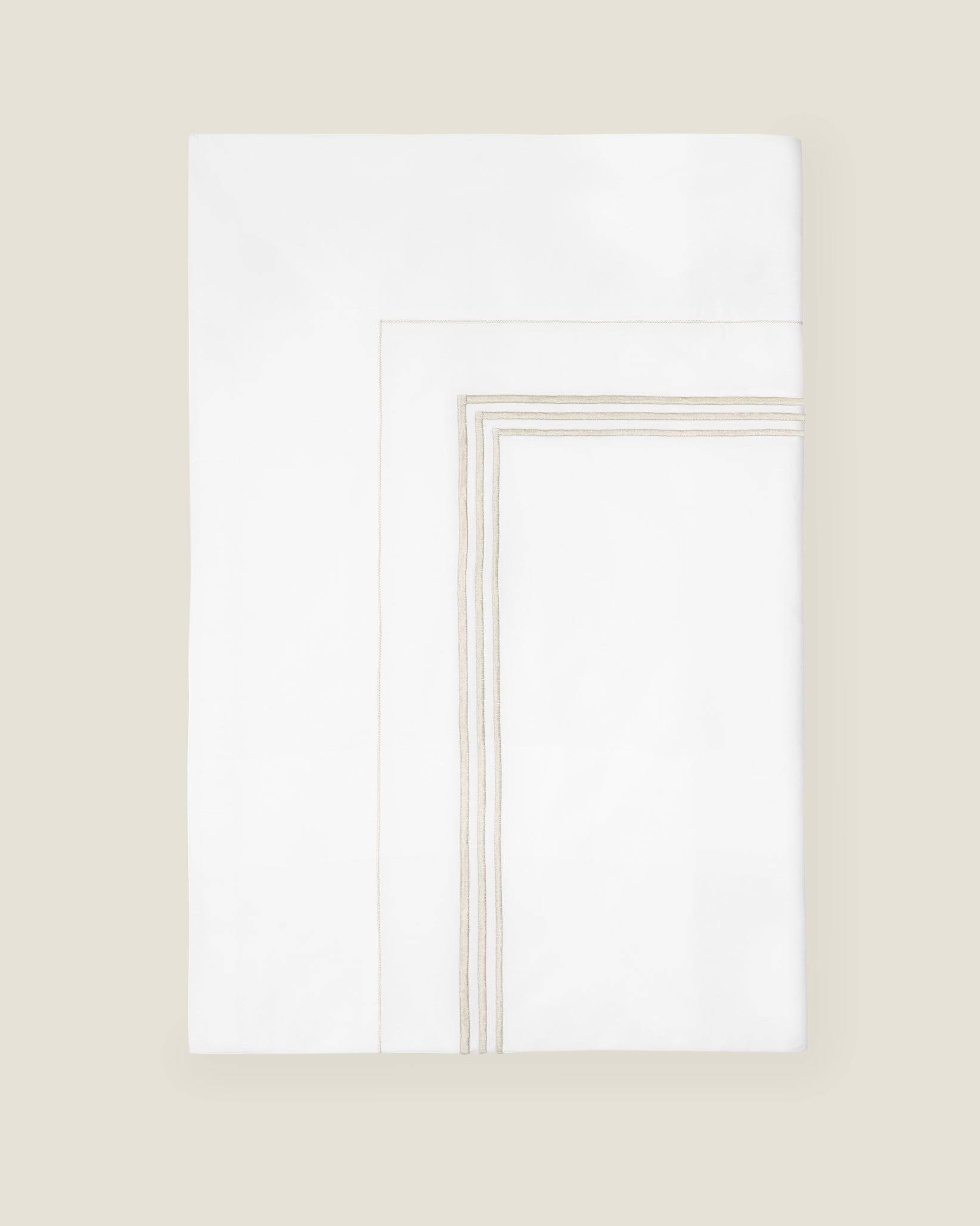 Tre Righe flat sheet white/sage folded.